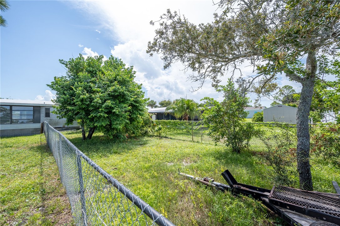 3836 13th Street Micco, FL 32976 - Photo 32 of 35 a view of backyard with green space