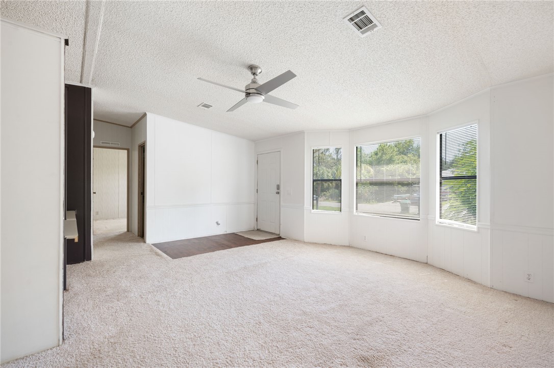 3836 13th Street Micco, FL 32976 - Photo 5 of 35 a view of an empty room with a window