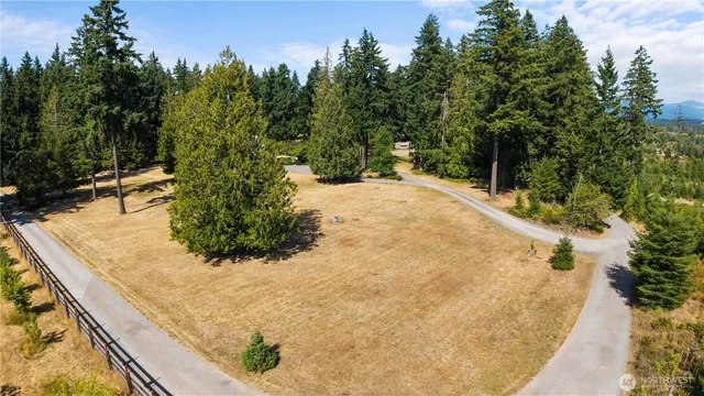 a view of a backyard of the house