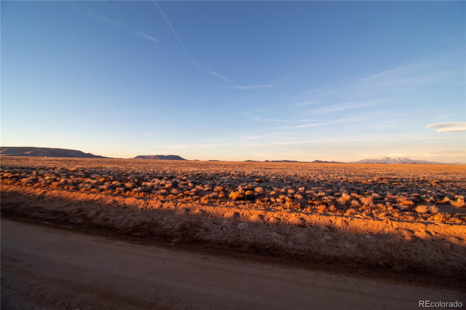 R036736 R036736 San Luis, CO 81152 - Photo 27 of 42 an aerial view of residential houses with outdoor space and trees