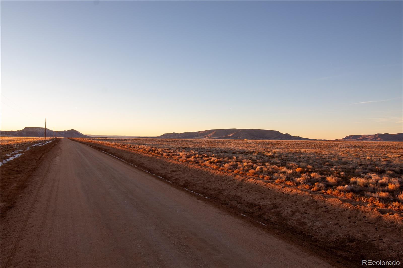 R036736 R036736 San Luis, CO 81152 - Photo 32 of 42 a view of a city with mountain