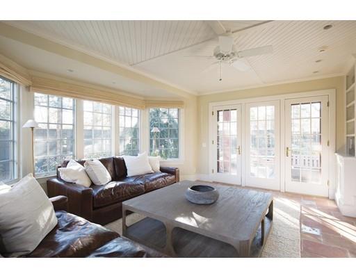 131 Laurel Road Brookline, MA 02467 - Photo 11 of 22 a living room with furniture and large windows