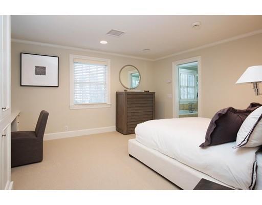 131 Laurel Road Brookline, MA 02467 - Photo 14 of 22 a bedroom with a bed and furniture