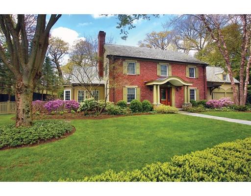 131 Laurel Road Brookline, MA 02467 - Photo 2 of 22 a front view of house with yard and green space