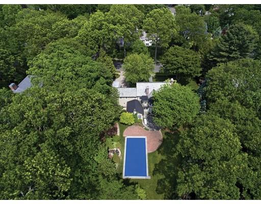 131 Laurel Road Brookline, MA 02467 - Photo 21 of 22 an aerial view of a house with a yard and trees