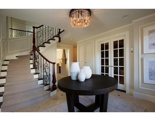 131 Laurel Road Brookline, MA 02467 - Photo 4 of 22 a view of a dining room with furniture and wooden floor