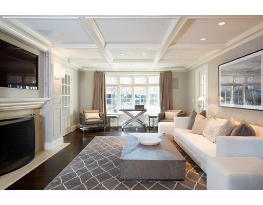 131 Laurel Road Brookline, MA 02467 - Photo 6 of 22 a living room with fireplace furniture and a flat screen tv
