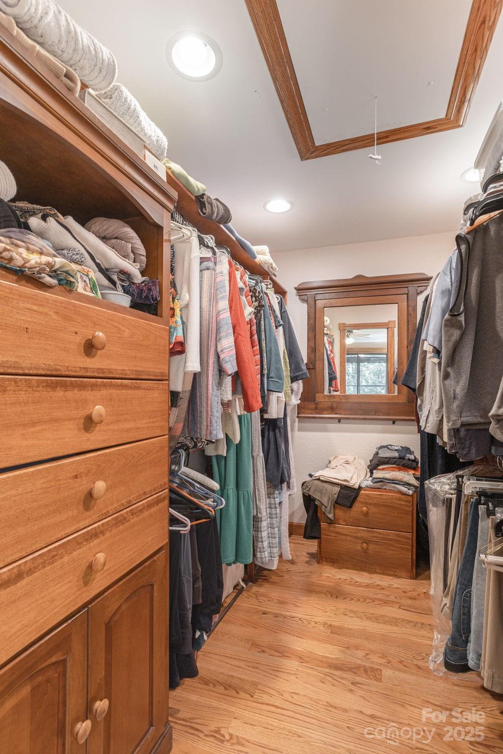 524 Three Mile Knob Road, Unit 3 Pisgah Forest, NC 28768 - Photo 29 of 33 a view of walk in closet with clothes and shoes