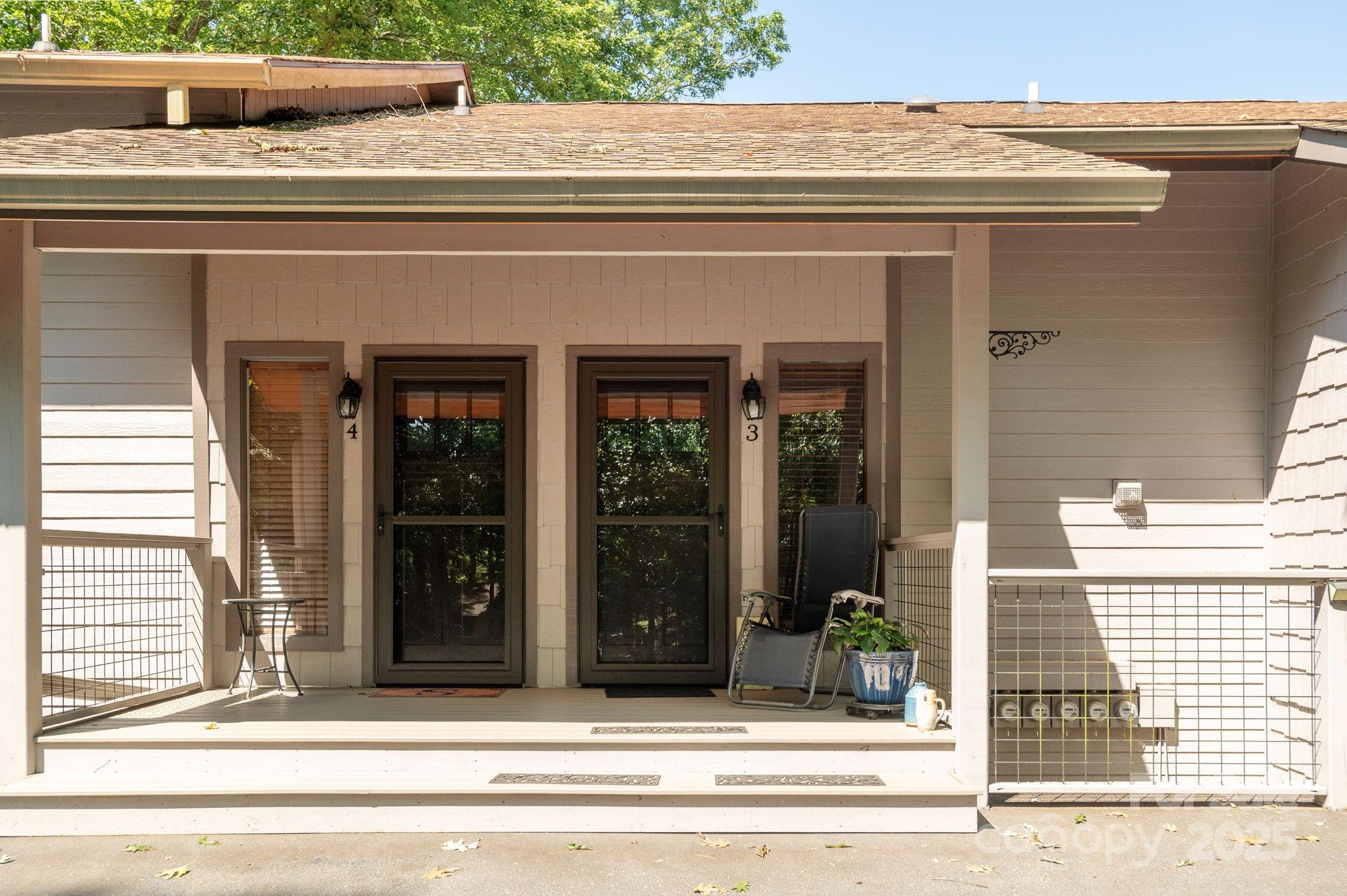 524 Three Mile Knob Road, Unit 3 Pisgah Forest, NC 28768 - Photo 7 of 33 a view of a entrance door of the house