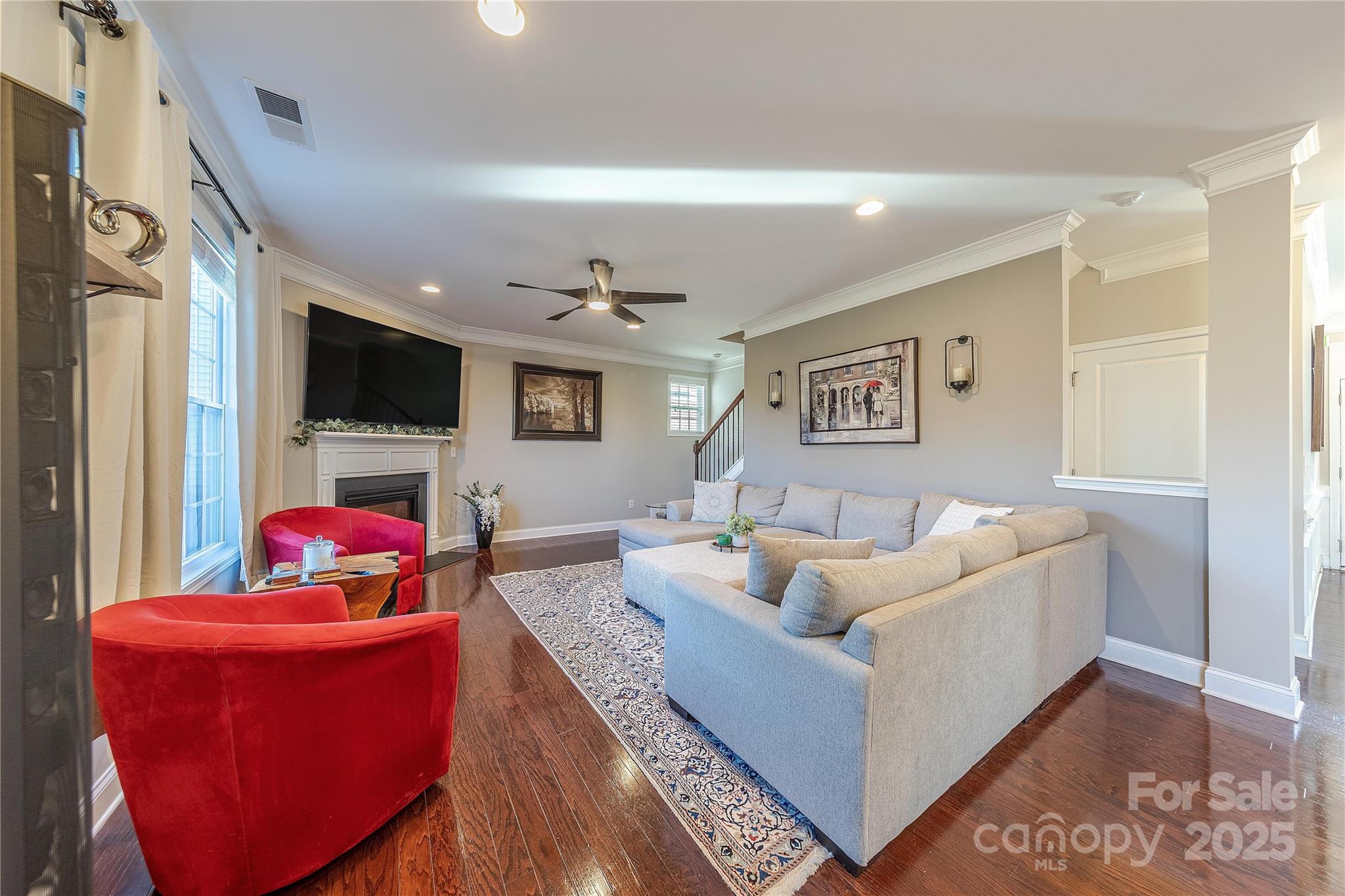 8344 Dallas Bay Road Charlotte, NC 28278 - Photo 11 of 25 a living room with furniture and a flat screen tv