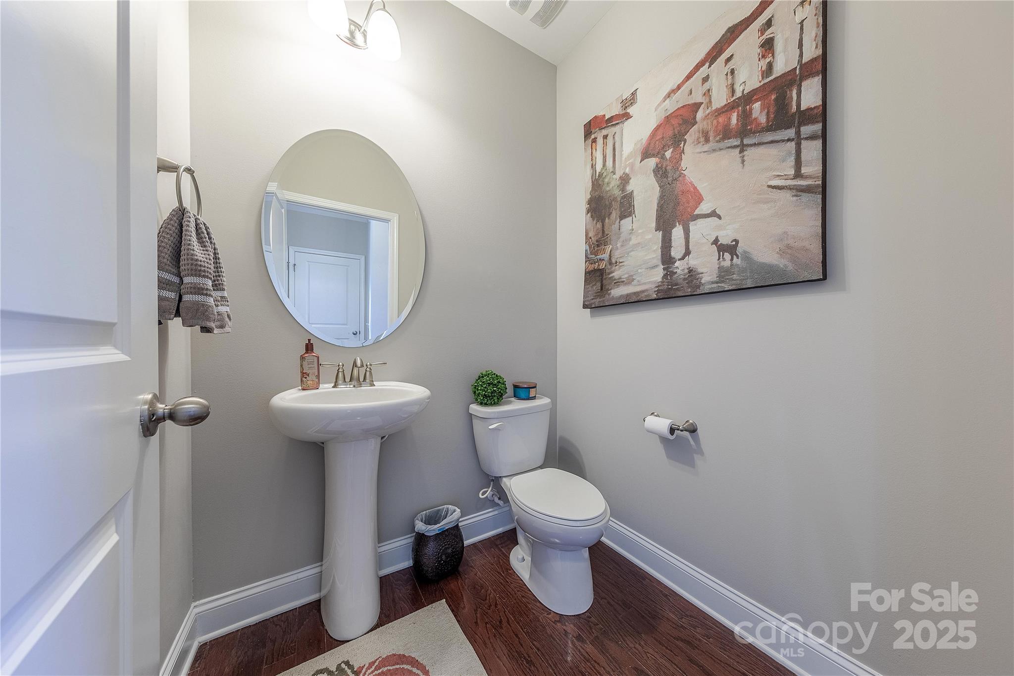 8344 Dallas Bay Road Charlotte, NC 28278 - Photo 15 of 25 a bathroom with a toilet and a sink