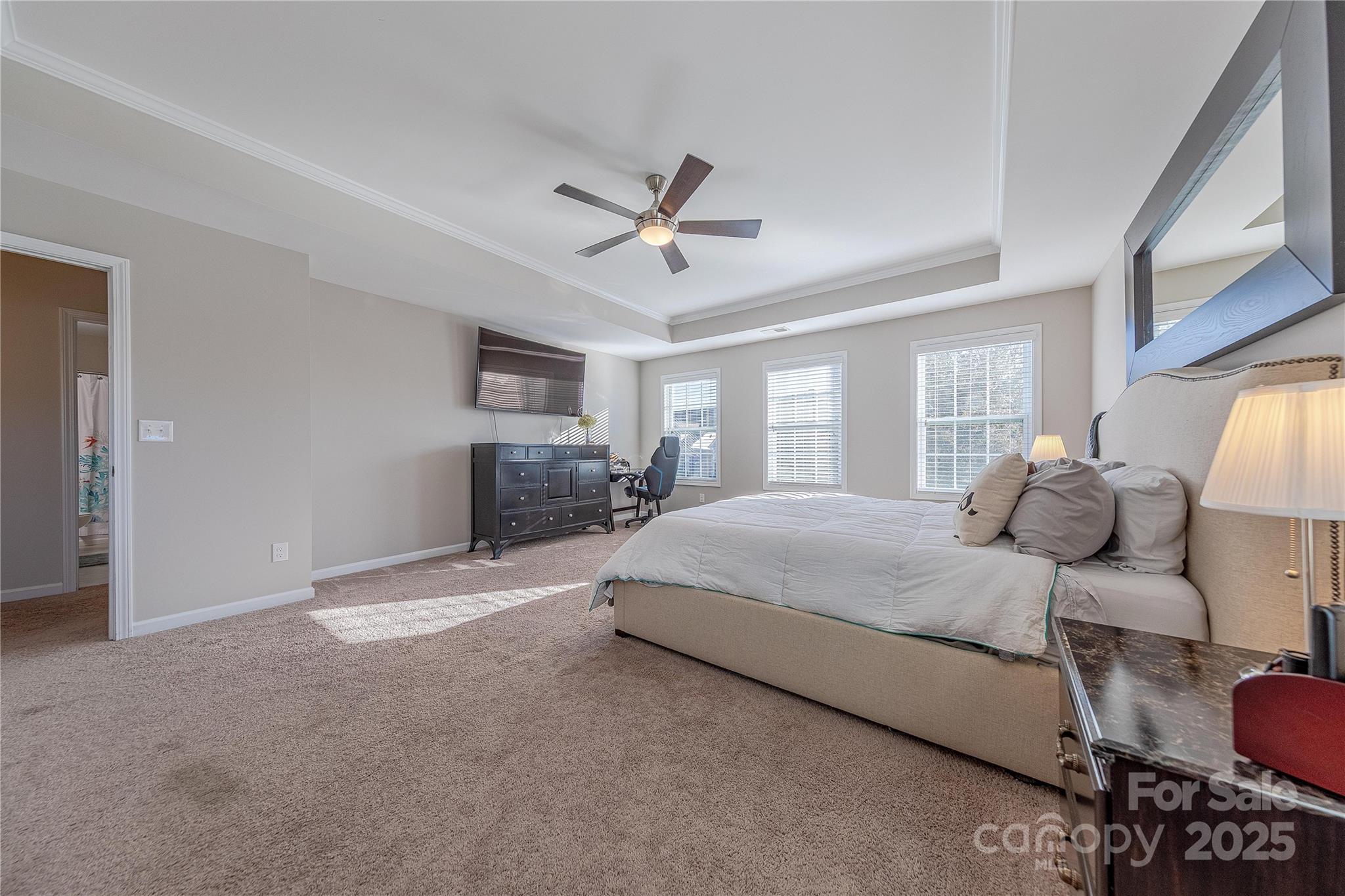 8344 Dallas Bay Road Charlotte, NC 28278 - Photo 18 of 25 a spacious bedroom with a bed and window