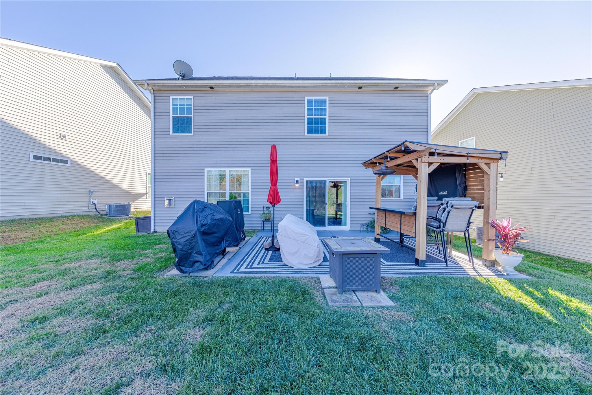 8344 Dallas Bay Road Charlotte, NC 28278 - Photo 25 of 25 a view of a house with a backyard
