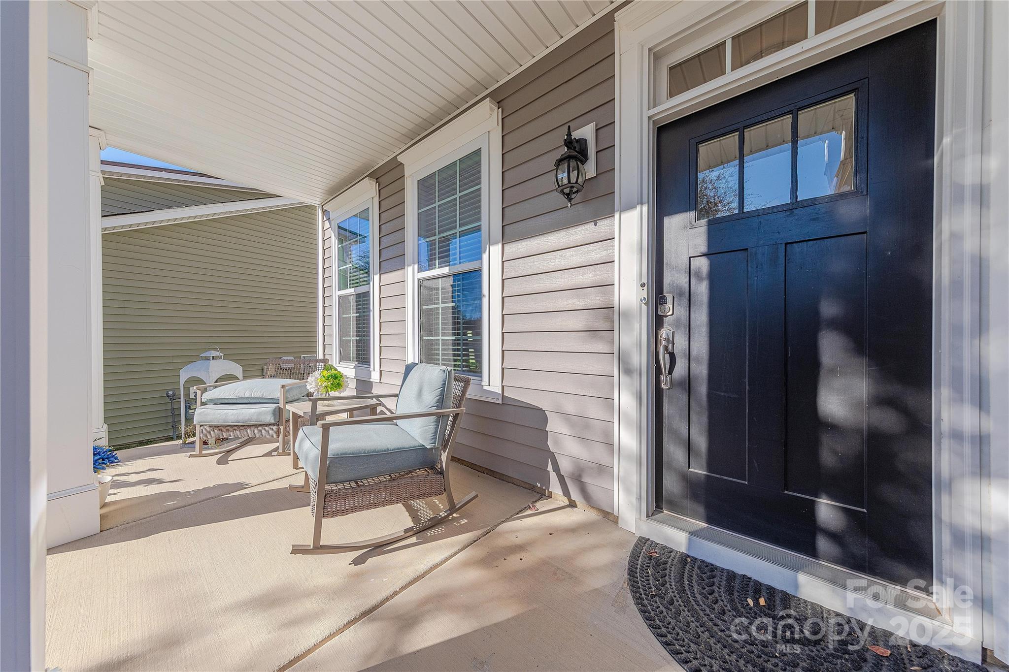 8344 Dallas Bay Road Charlotte, NC 28278 - Photo 3 of 25 a building outdoor space with patio furniture