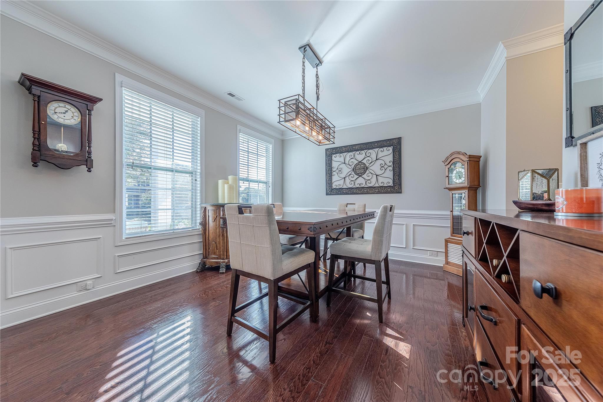 8344 Dallas Bay Road Charlotte, NC 28278 - Photo 7 of 25 a view of a dining room with furniture window and wooden floor
