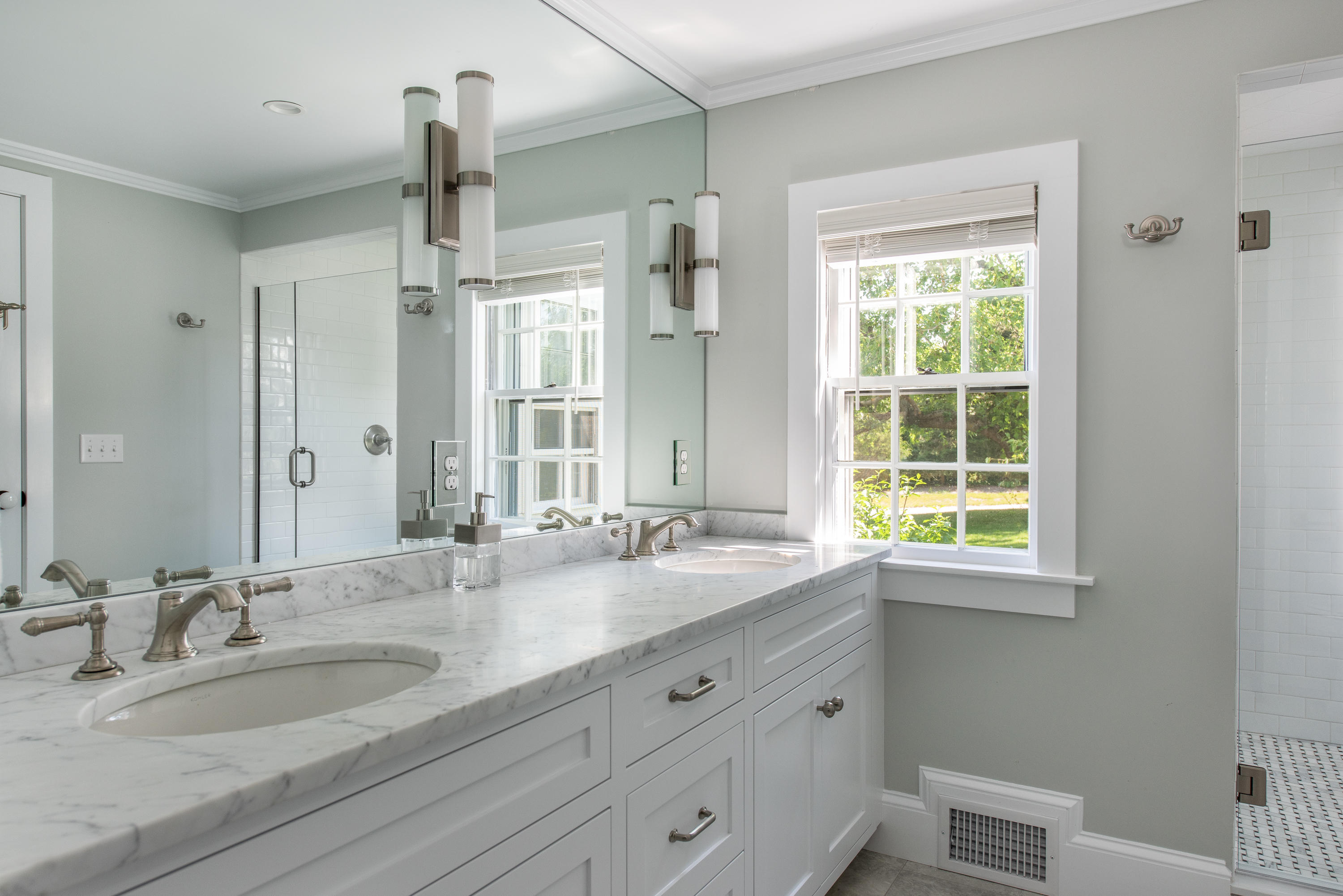5 Smiths Point Road West Yarmouth, MA 02673 - Photo 20 of 31 a bathroom with double vanity sinks and a mirror