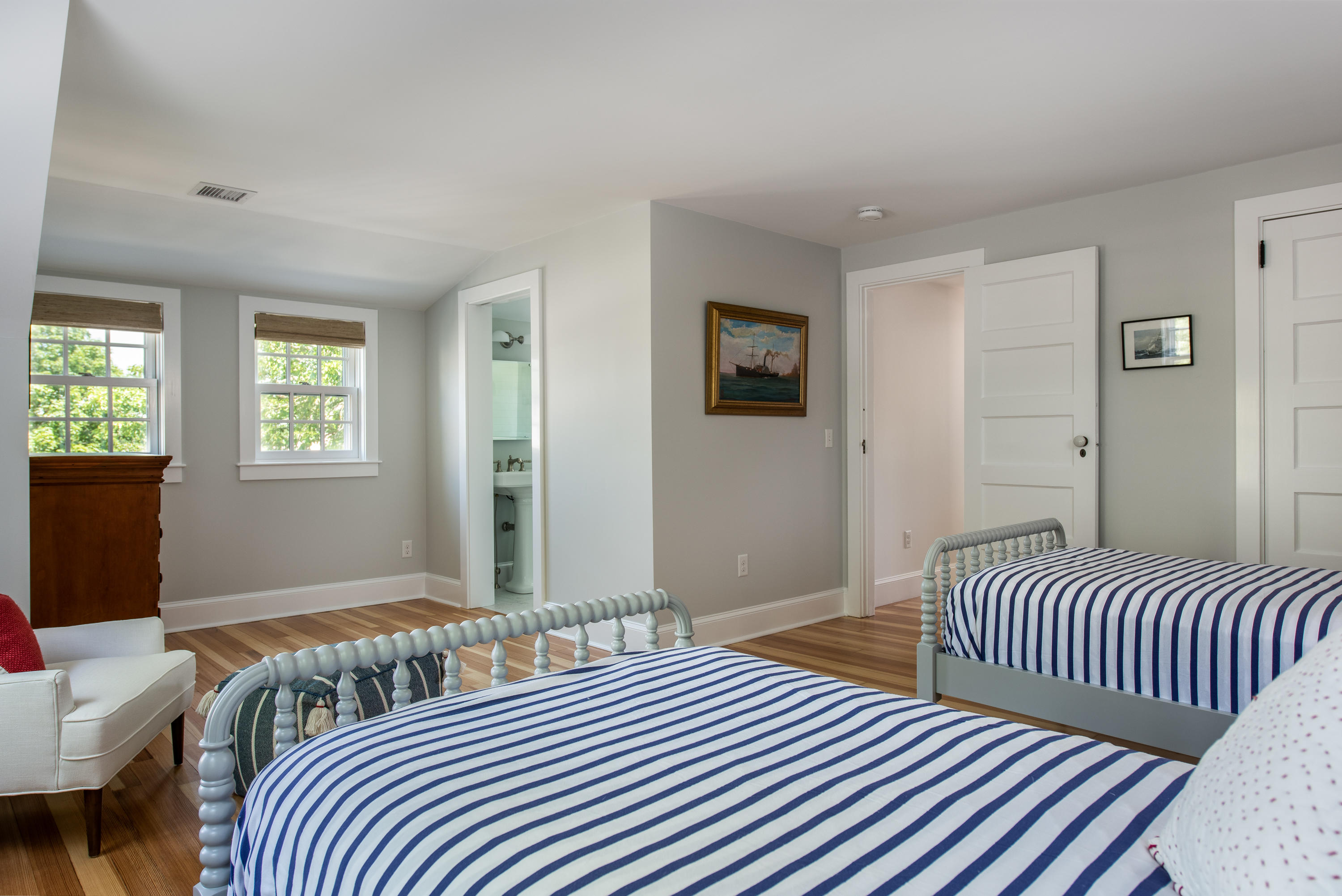5 Smiths Point Road West Yarmouth, MA 02673 - Photo 27 of 31 a bedroom with a bed and wooden floor