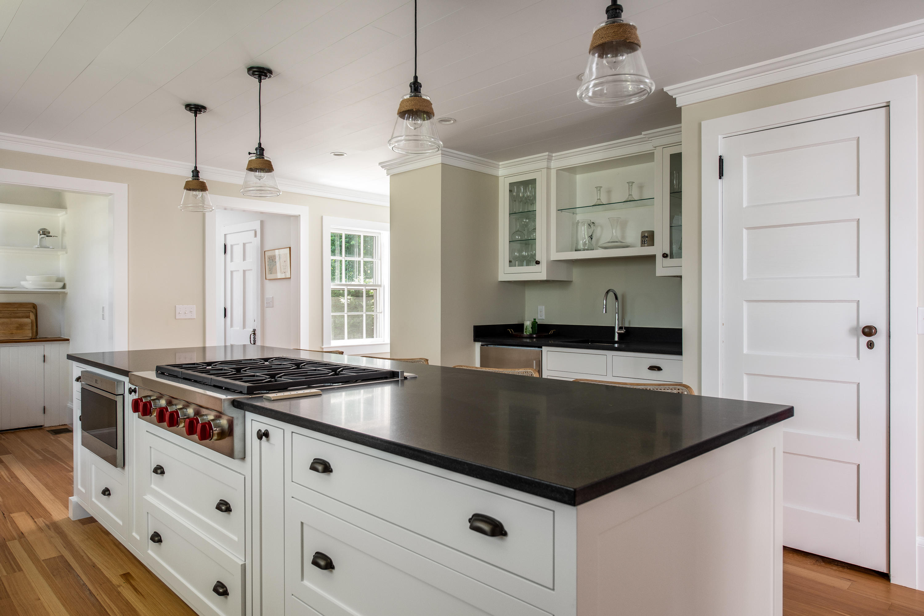 5 Smiths Point Road West Yarmouth, MA 02673 - Photo 9 of 31 a kitchen with granite countertop a stove sink and cabinets