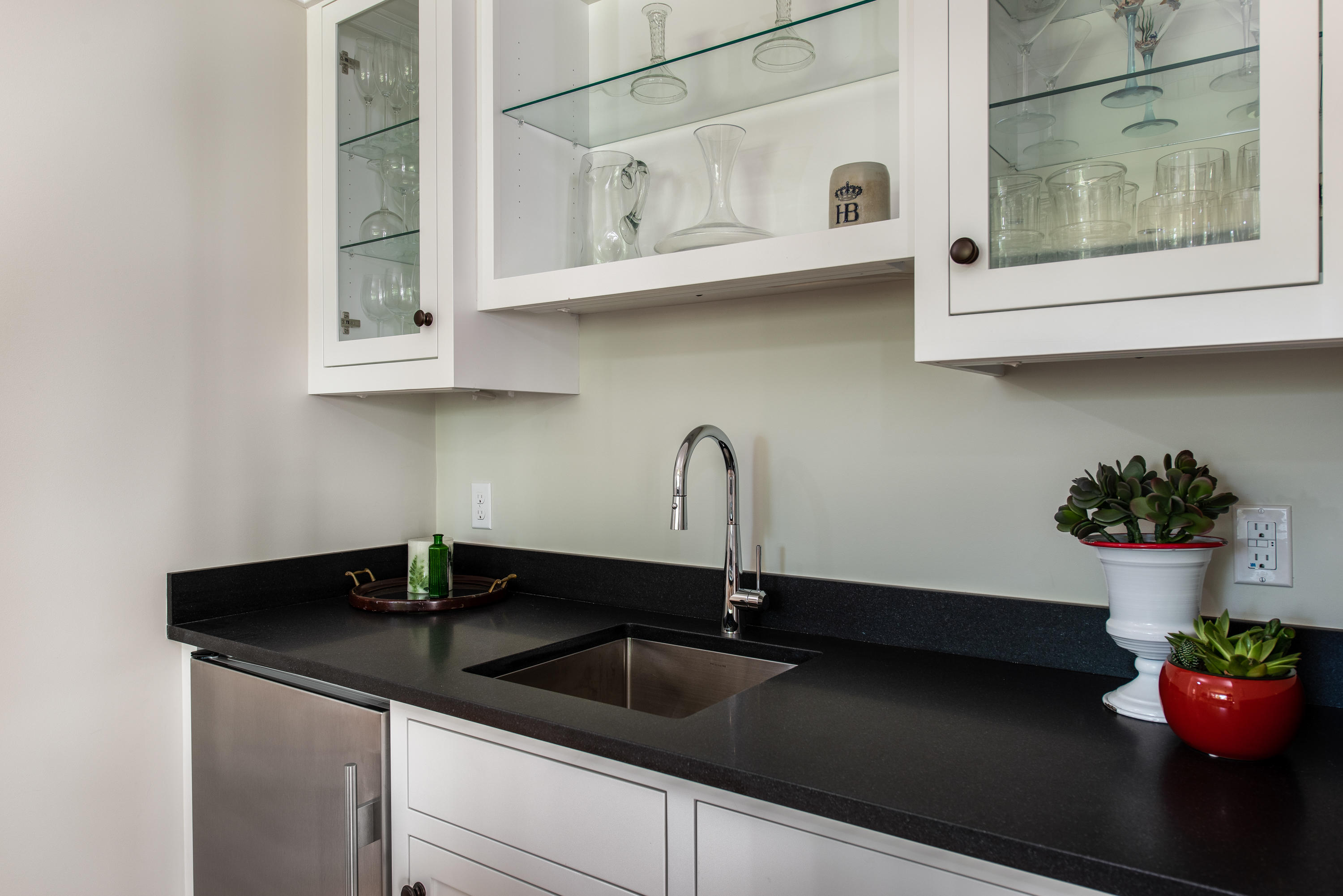 5 Smiths Point Road West Yarmouth, MA 02673 - Photo 10 of 31 a kitchen with stainless steel appliances granite countertop a sink and cabinets