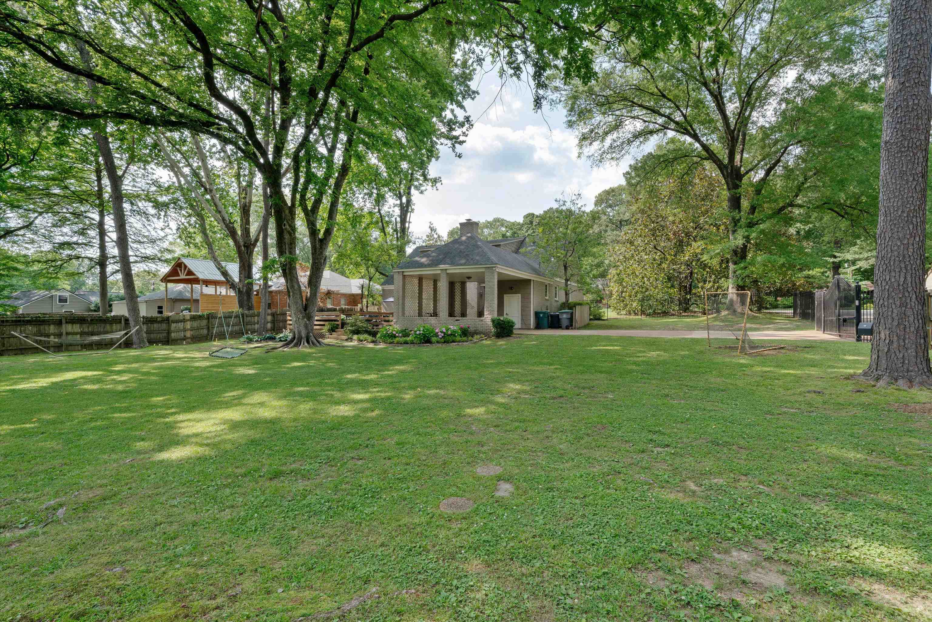 5265 South Angela Road Memphis, TN 38120 - Photo 23 of 26 a view of house that has a big yard
