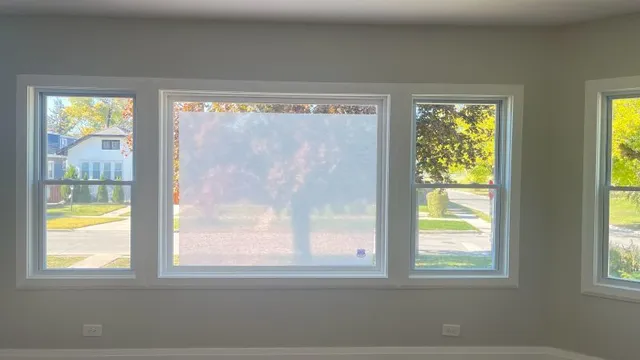 a view of a glass door and a window