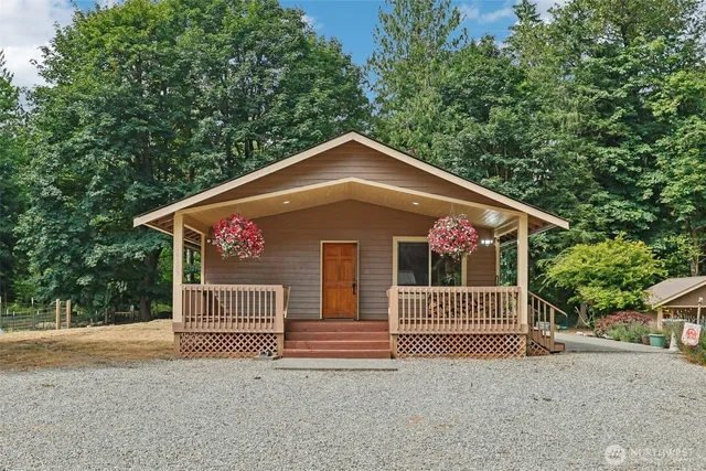 a front view of a house with a garage
