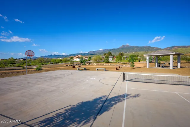 a view of a street with a building in the background
