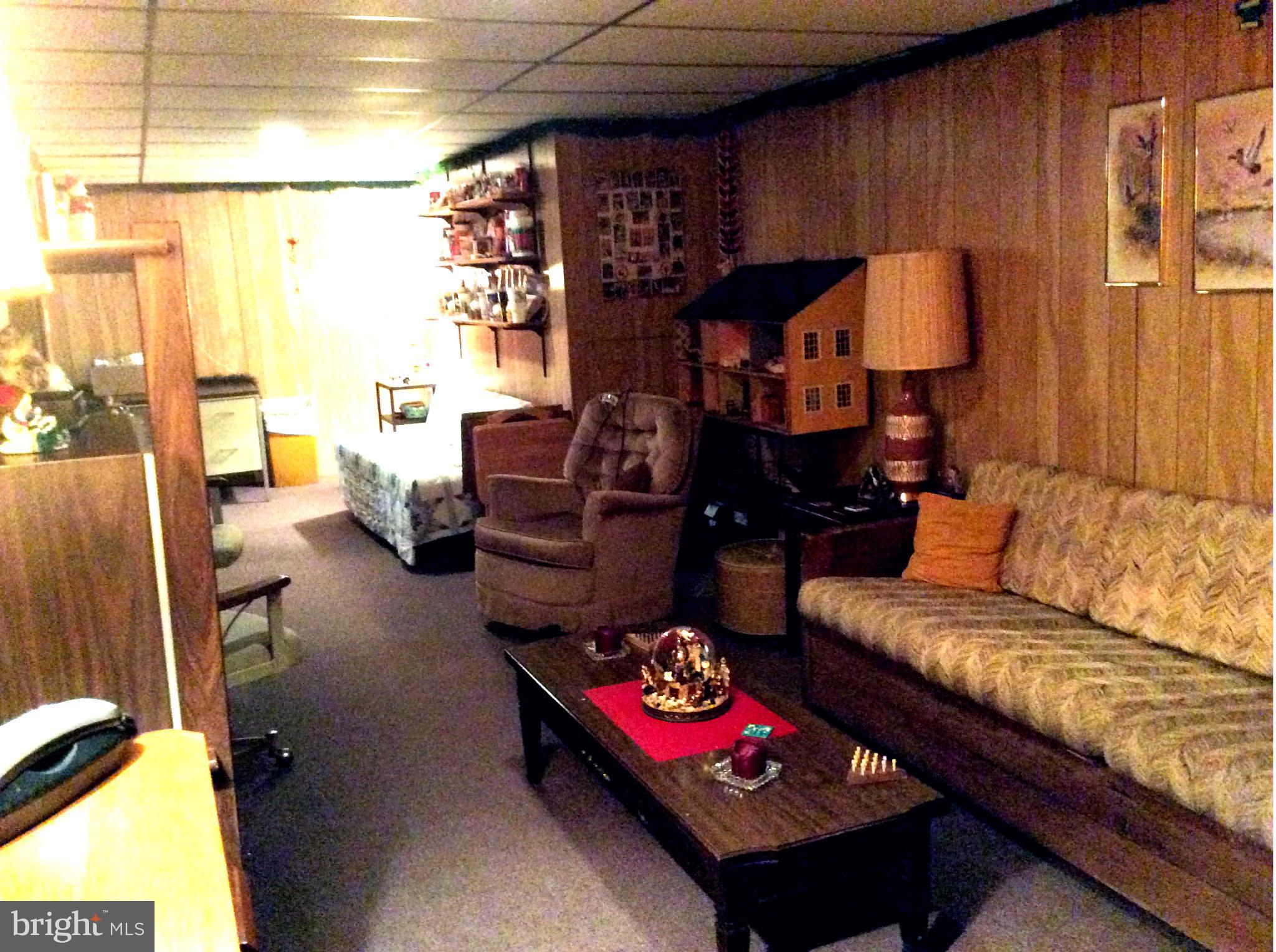 518 Holy Cross Road Baltimore, MD 21225 - Photo 15 of 29 Full Basement with Walk-out to Yard