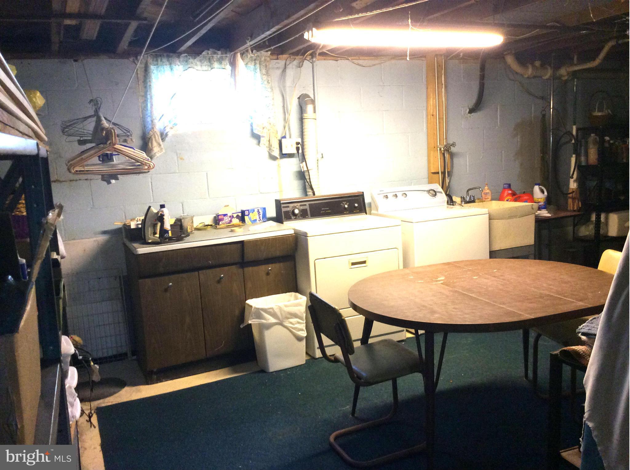 518 Holy Cross Road Baltimore, MD 21225 - Photo 22 of 29 Large Laundry Area