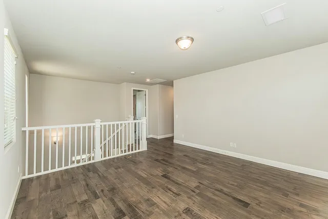 a view of a livingroom with wooden floor