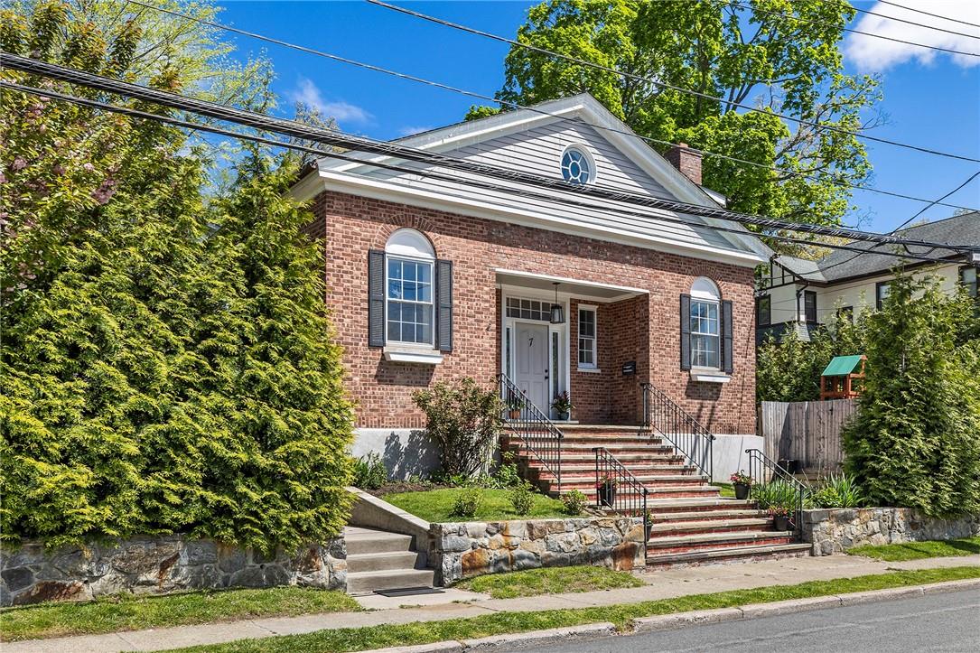 7 Wolden Road Ossining, NY 10562 - Photo 1 of 1 a front view of a house with a yard