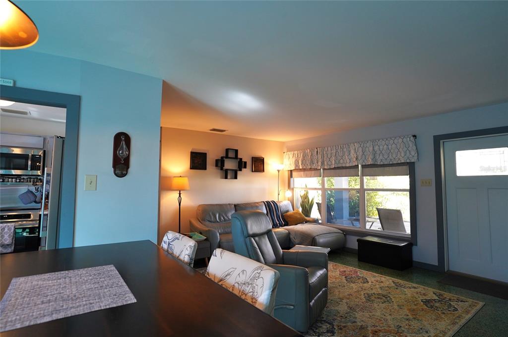 2357 Talbrook Terrace Punta Gorda, FL 33983 - Photo 11 of 55 a living room with furniture and a window