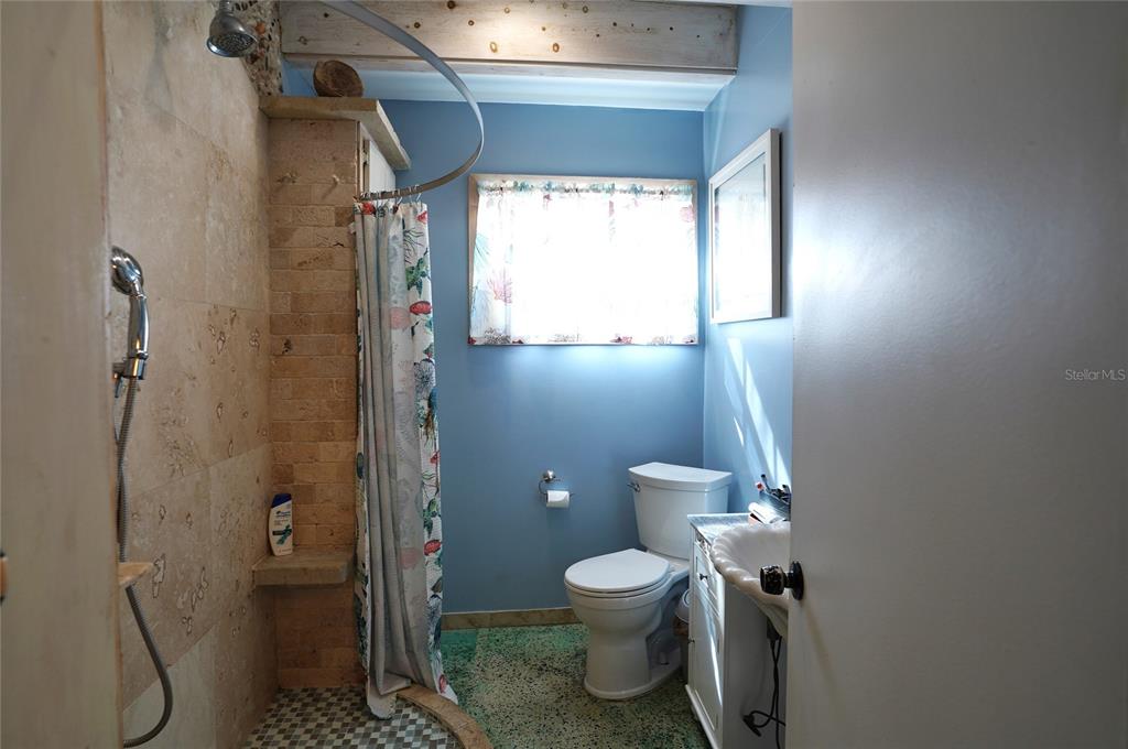 2357 Talbrook Terrace Punta Gorda, FL 33983 - Photo 14 of 55 a bathroom with a toilet and a shower