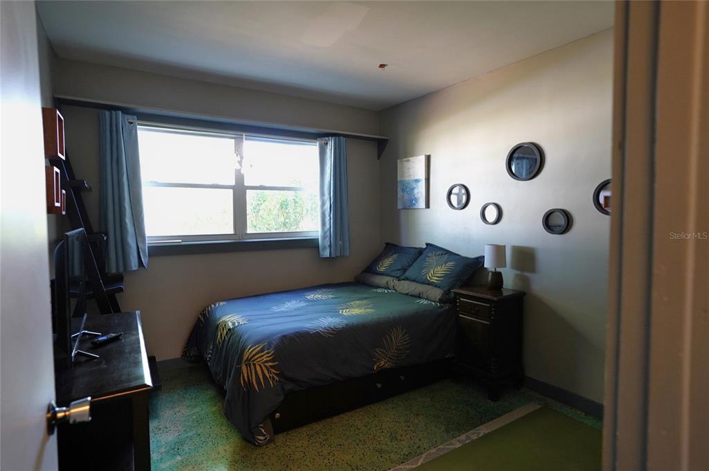 2357 Talbrook Terrace Punta Gorda, FL 33983 - Photo 15 of 55 a bedroom with a bed and a window