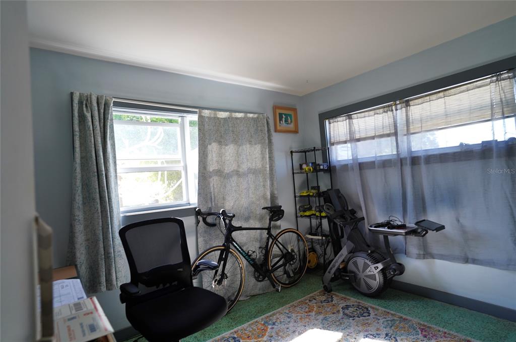 2357 Talbrook Terrace Punta Gorda, FL 33983 - Photo 16 of 55 a view of a room with gym equipment and a window