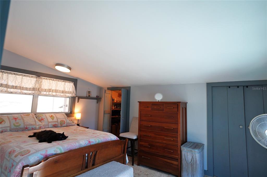 2357 Talbrook Terrace Punta Gorda, FL 33983 - Photo 21 of 55 a bedroom with a bed and a window