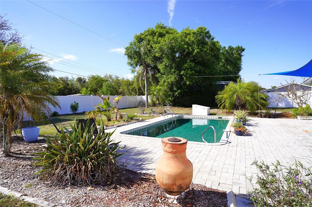 2357 Talbrook Terrace Punta Gorda, FL 33983 - Photo 23 of 55 a view of a swimming pool with a patio
