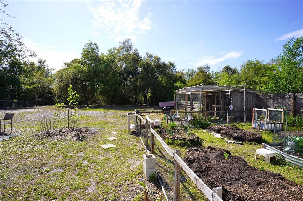 2357 Talbrook Terrace Punta Gorda, FL 33983 - Photo 26 of 55 a view of backyard with swimming pool and seating space