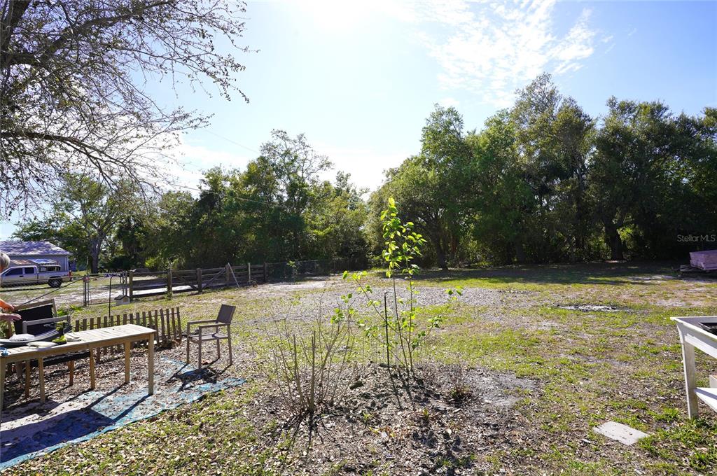 2357 Talbrook Terrace Punta Gorda, FL 33983 - Photo 27 of 55 a view of a backyard with swimming pool