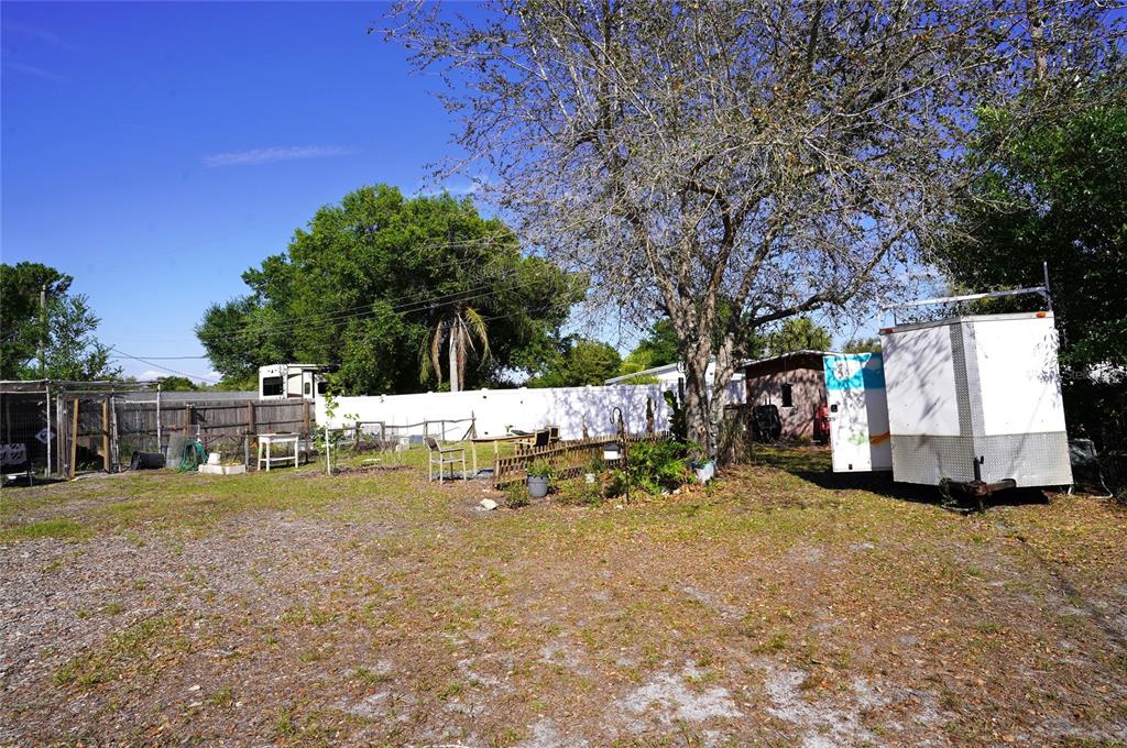 2357 Talbrook Terrace Punta Gorda, FL 33983 - Photo 28 of 55 a view of a house with a yard and sitting area