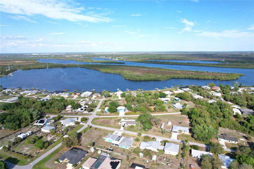 2357 Talbrook Terrace Punta Gorda, FL 33983 - Photo 32 of 55 a view of a lake with an ocean