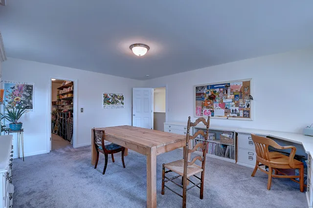 a view of a livingroom with furniture