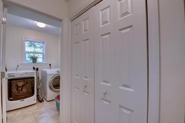 a utility room with dryer and washer
