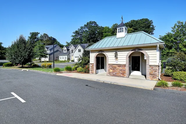 a view of a house with a street