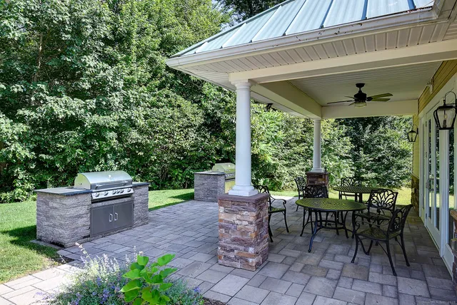 a view of a chairs and table in the patio