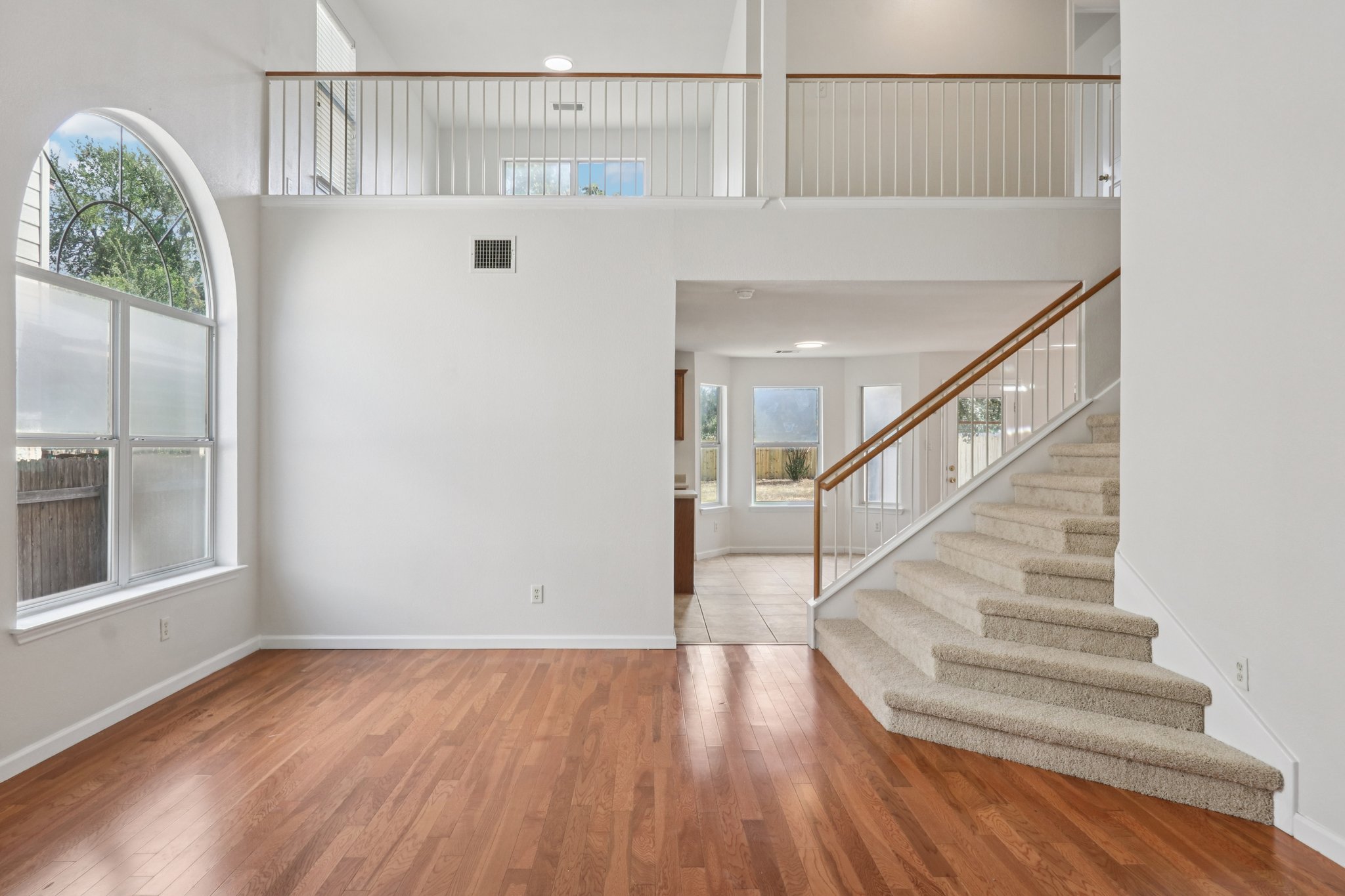 14521 Ballycastle Trail Austin, TX 78717 - Photo 1 of 40 a view of entryway with wooden floor