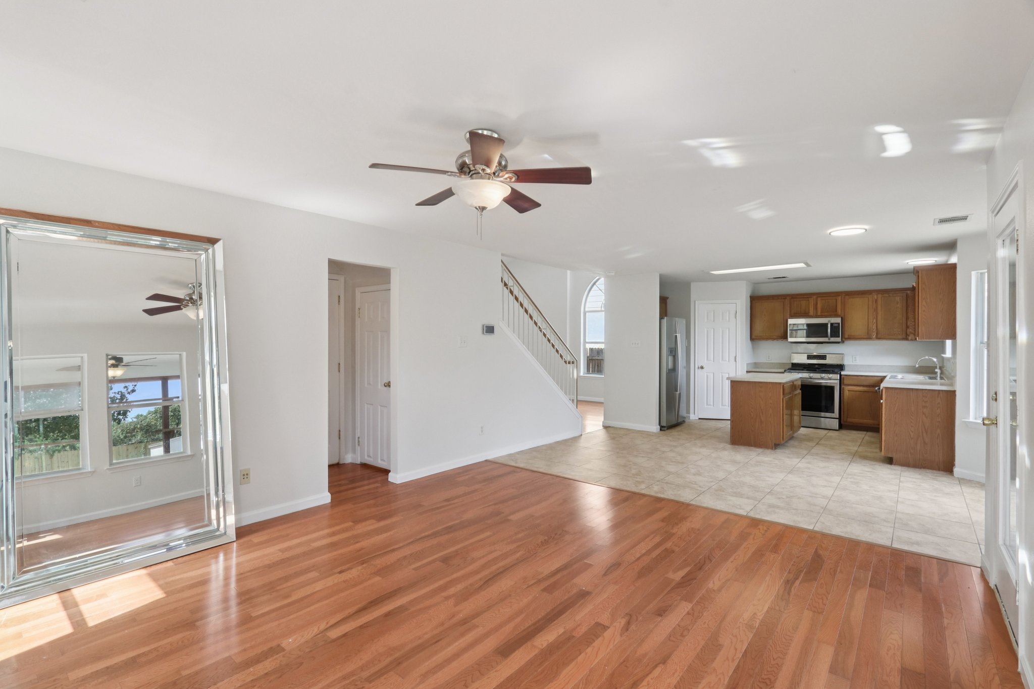 14521 Ballycastle Trail Austin, TX 78717 - Photo 12 of 40 a view of a kitchen with wooden floor and a kitchen