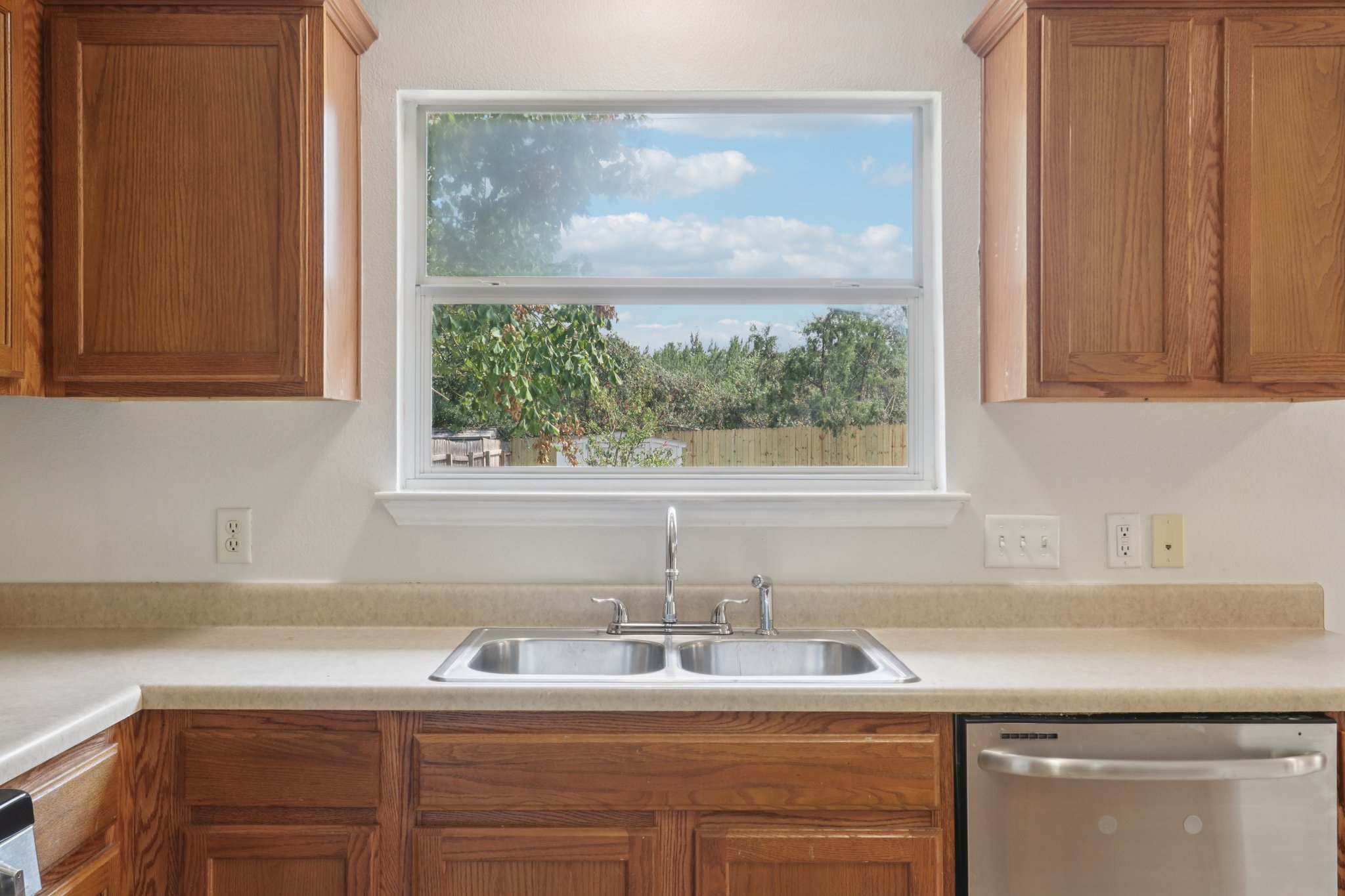 14521 Ballycastle Trail Austin, TX 78717 - Photo 16 of 40 a kitchen with a sink and a window