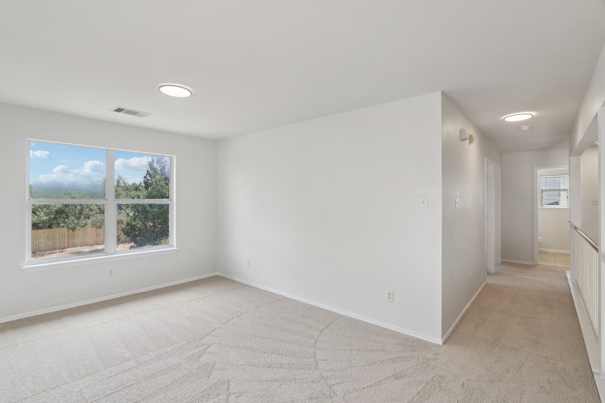 14521 Ballycastle Trail Austin, TX 78717 - Photo 30 of 40 a view of an empty room with a window