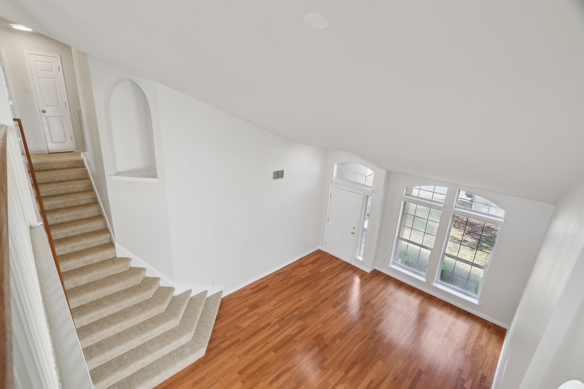 14521 Ballycastle Trail Austin, TX 78717 - Photo 33 of 40 a view of a room with wooden floor and white walls